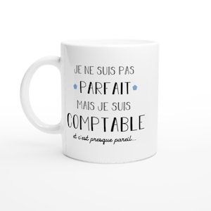 May include: White ceramic mug with black text that reads "Je ne suis pas parfait mais je suis comptable et c'est presque pareil..."  The text is surrounded by two small blue stars.