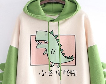 designer dinosaur sweater
