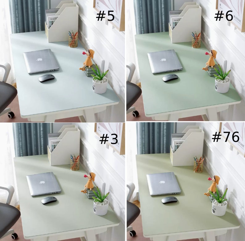 May include: Four different desk mats in light green, light blue, and gray colors. Each mat has a laptop, mouse, and a small potted plant on it. The mats are on white desks with white file folders and pencils on them. The mats are labeled with numbers 3, 5, 6, and 76.