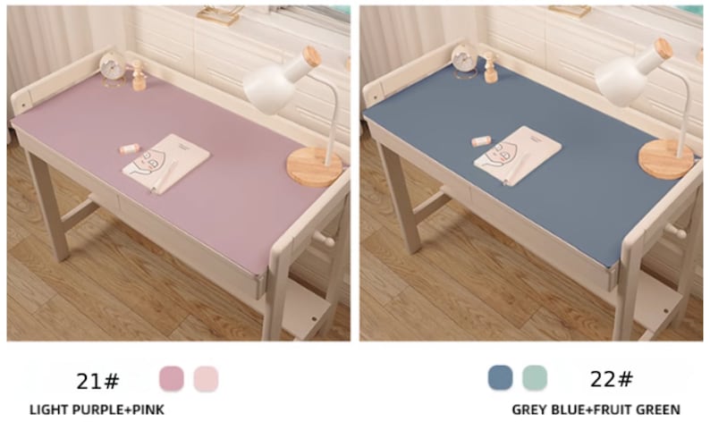 May include: Two desk mats, one light purple and one grey blue, with a white desk and a lamp on each. The text "21# LIGHT PURPLE+PINK" is below the purple mat and the text "22# GREY BLUE+FRUIT GREEN" is below the blue mat.