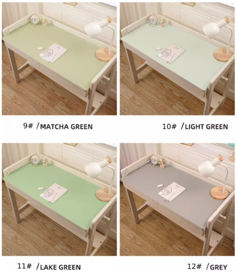 May include: Four different colored desk mats on a white desk with a lamp and a book. The colors are matcha green, light green, lake green, and grey.