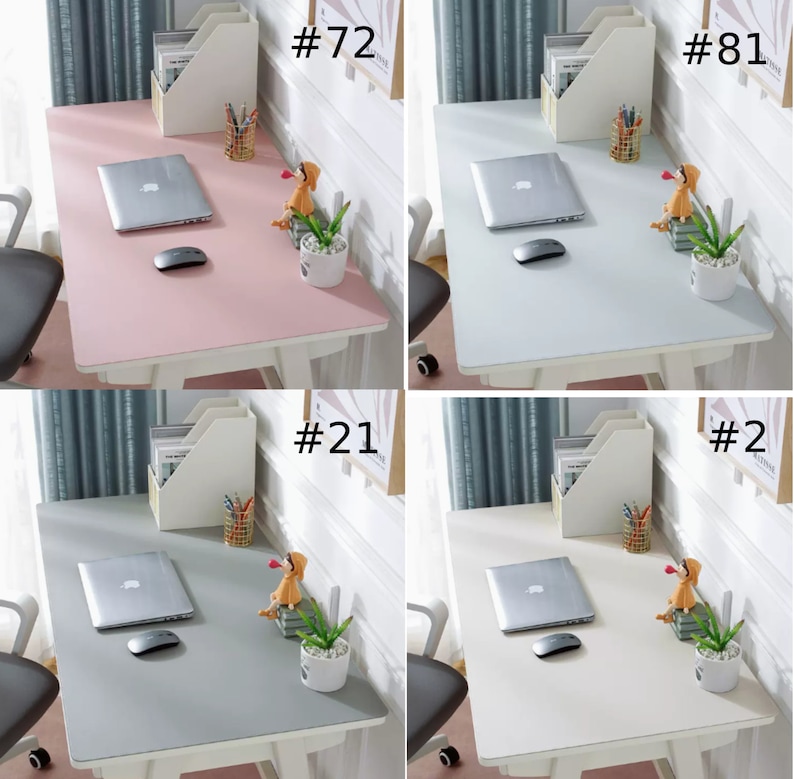 May include: Four different desk mats in pink, light blue, gray, and white. Each mat has a laptop, mouse, and small potted plant on it. The mats are labeled with numbers #72, #81, #21, and #2.
