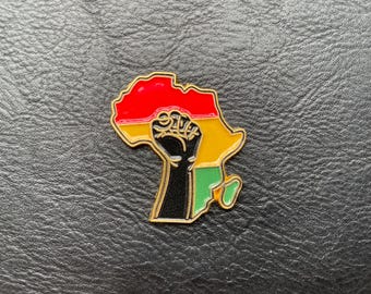 PatsyPutty Gold Enamel Black Fist on Africa Cover Minder Naald minder