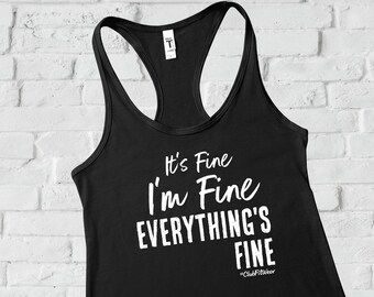 May include: Black tank top with white text that reads "It's Fine I'm Fine Everything's Fine" and "ClubFitWear" in smaller font.