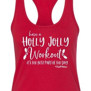 May include: Red tank top with a white graphic that says "have a HOLLY JOLLY Workout! It's the best part of the day #ClubFitWear"