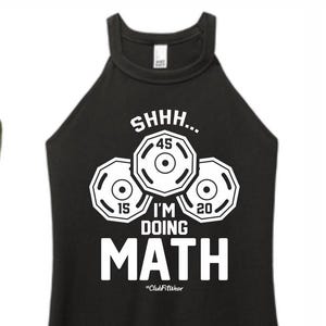 May include: Black tank top with a white graphic of weight plates and the text "Shhh... I'm doing math #ClubFitWear"
