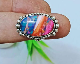 Rosa taggig ostronturkosring: Handgjord sterlingsilverring med statementmotiv