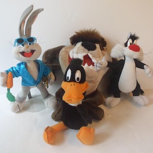 Vintage 1990's Lot of 4 Looney Toons Plush Characters - Bugs Bunny, Daffy Duck, Sylvester and Tazmanian Devil