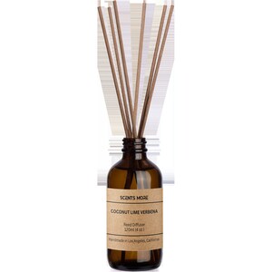 May include: A brown glass bottle with a brown label that reads "SCENTS MORE COCONUT LIME VERBENA Reed Diffuser 120ml (4 oz) Handmade in Los Angeles, California". The bottle is filled with a clear liquid and has brown sticks sticking out of the top.