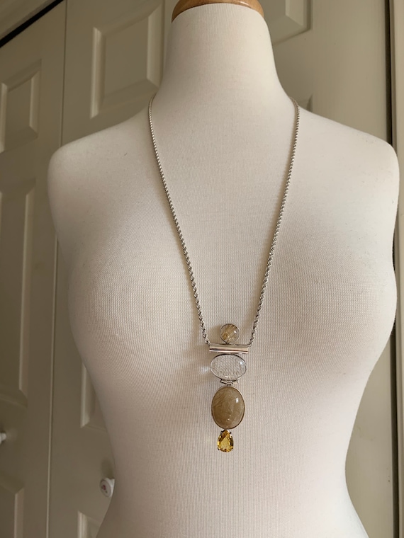 Rutilated Quartz, Rock Crystal, Citrine and Sterli