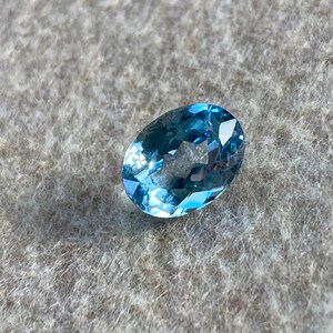 Loose oval shaped blue topaz gemstone