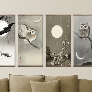 May include: Four framed prints with a Japanese aesthetic. Each print features a different scene with an owl, a bat, a crescent moon, and a full moon. The prints are in shades of gray, white, and black.
