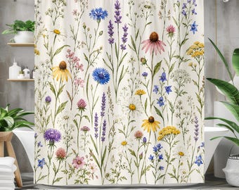 May include: A shower curtain with a watercolour design of wildflowers in shades of yellow, blue, purple, pink, and white. The curtain hangs in front of a white bathtub, creating a nature-inspired bathroom decor.