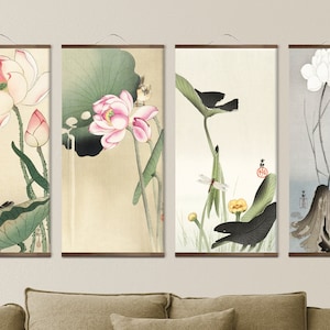 May include: Four framed prints with a Japanese aesthetic. Each print features a lotus flower, leaves, and a bird. The prints are in shades of pink, green, black, and white.