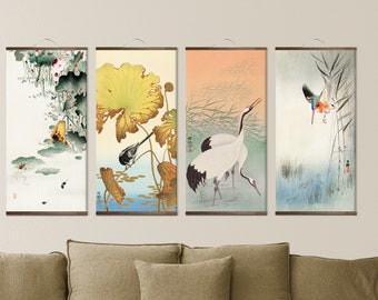 May include: Four vertical wall art panels with Japanese-style nature scenes. Each panel features a different image of birds, plants, and water. The panels are framed with a dark wood and hung with a simple cord.