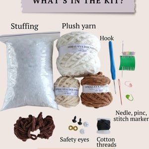 Materials for cow crochet kit including plush yarn, stuffing, hook and tools