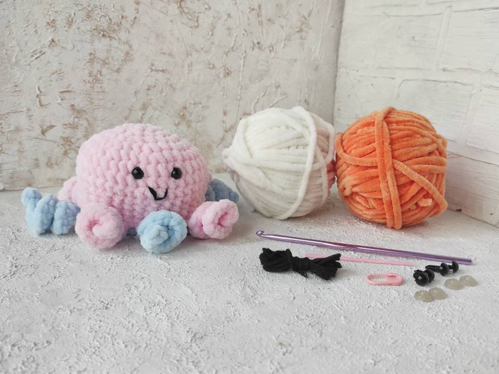 crochet kit contents and pattern for a crochet reversible octopus