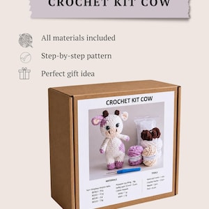 Complete DIY crochet kit for cow plush toy in gift packaging