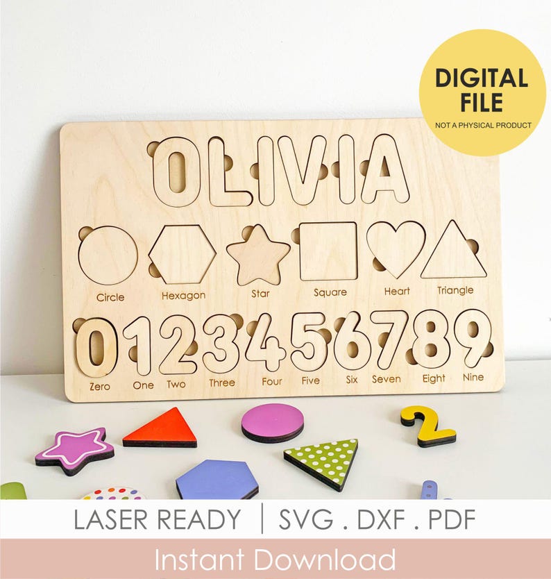 May include: Wooden puzzle board featuring the name "OLIVIA", shapes, and numbers. Includes removable shapes and numbers. The text "DIGITAL FILE" and "LASER READY" are also visible.