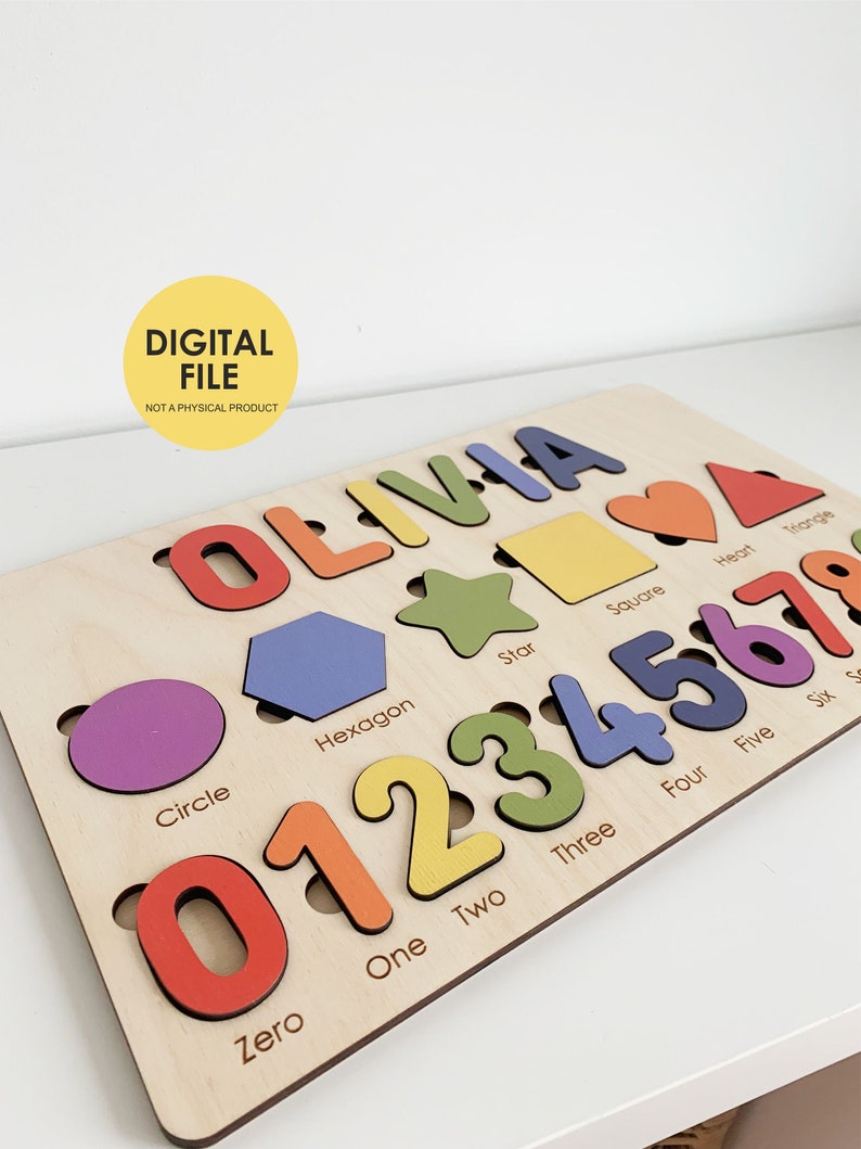 May include: Wooden educational puzzle with the name "OLIVIA" in colourful letters, shapes, and numbers 0-7. Includes a circle, hexagon, star, square, heart, and triangle. The text "DIGITAL FILE NOT A PHYSICAL PRODUCT" is also present.
