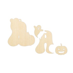 May include: A set of three unfinished light-colored wooden cutouts featuring Halloween-themed shapes. The pieces include a large pumpkin-shaped letter, a letter shape with a ghost silhouette, and a small jack-o'-lantern with a carved face.