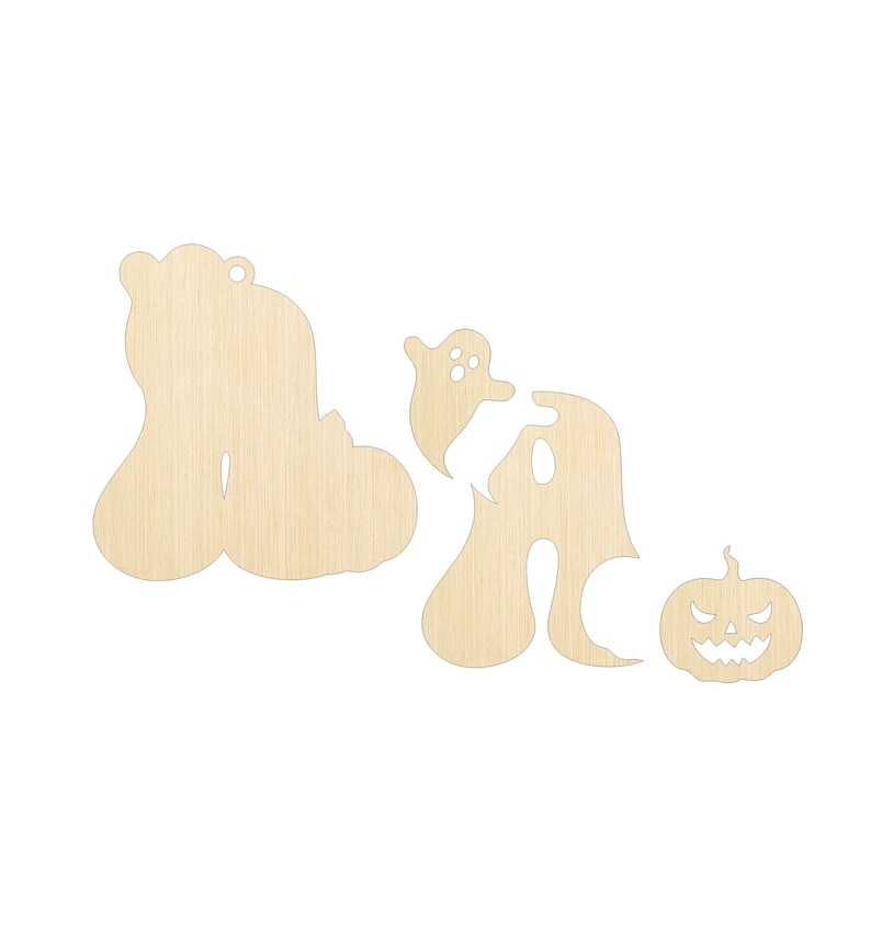 May include: A set of three unfinished light-colored wooden cutouts featuring Halloween-themed shapes. The pieces include a large pumpkin-shaped letter, a letter shape with a ghost silhouette, and a small jack-o'-lantern with a carved face.