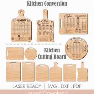 May include: A collection of light-colored wooden kitchen cutting boards in various shapes, including rectangular, round, and paddle styles. Several boards feature laser-engraved kitchen conversion charts, measurement tables, and text reading Kitchen Conversion.