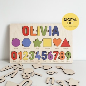 May include: Wooden educational puzzle with the name "OLIVIA" in colourful letters, shapes, and numbers 0-9. Includes matching wooden puzzle pieces. The text "DIGITAL FILE NOT A PHYSICAL PRODUCT" is also visible.