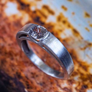 Light Pink Sapphire Ring in Half Bezel Setting