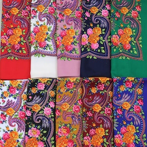 May include: Ten colourful patterned fabric squares with a floral design. The squares are arranged in two rows of five. The fabric is a traditional paisley pattern with a floral motif. The colours of the squares are red, white, pink, blue, green, black, gold, burgundy, blue, and green.