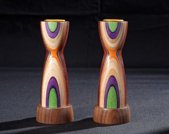 Wooden Pair of Candlesticks with skateboard wood detail.