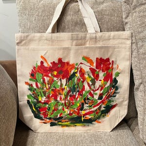 Bolso de canvas pintado a mano con diseño floral rojo