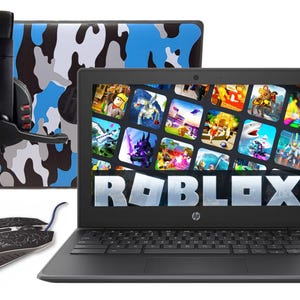 May include: A black laptop displaying the Roblox logo and game icons on its screen, accompanied by a black gaming headset with a microphone and a black wired computer mouse featuring a white web-like pattern on its top surface.