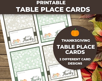 May include: Printable Thanksgiving table place cards with two different designs. One design features a green and white floral pattern with the text "Give Thanks" and a small pumpkin illustration. The other design features a beige and white floral pattern with the text "Thankful For" and a small pumpkin illustration.
