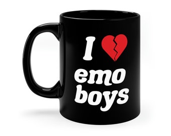 May include: Black coffee mug with white text that reads "I love emo boys" and a red broken heart graphic.