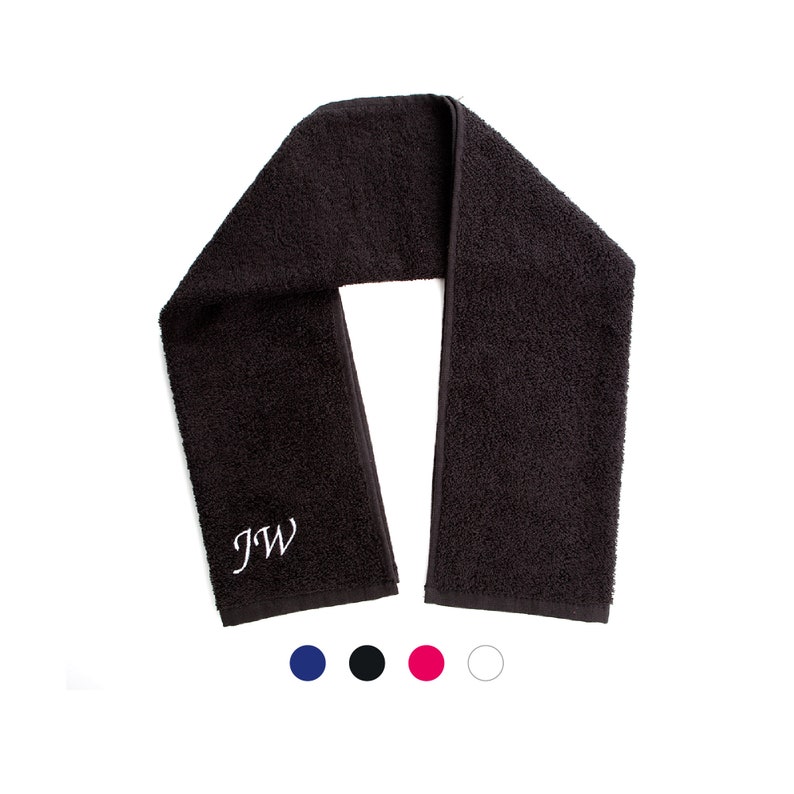 May include: A black towel with the initials "JW" embroidered in white on one end.