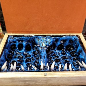 Many Eyed Blue and Black Book Mimic