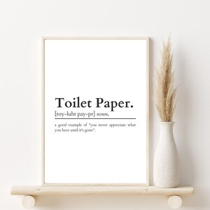 May include: A black and white printable wall art print with the definition of toilet paper. The text reads "Toilet Paper. [toy-luht pay-pr] noun. a good example of "you never appreciate what you have until it's gone"."