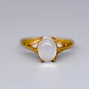 A very pretty vintage cabochon moonstone ring, mounted in 9ct gold, marked for Birmingham 1991