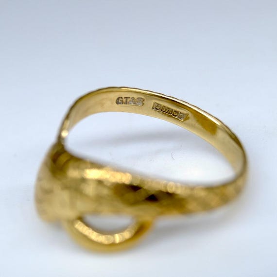 A beautifully engraved solid 9ct coiled snake ring - image 4