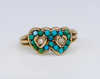 A very special antique turquoise and pearl double heart ring mounted in 9ct yellow gold, circa 1890