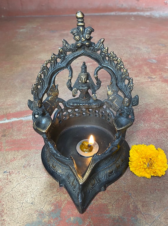 Kamatchi vilakku outlet in english