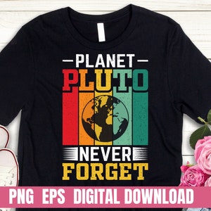 May include: Black t-shirt with a retro design featuring the text "Planet Pluto Never Forget" and a stylized image of Pluto with colorful stripes in the background.