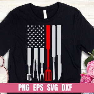 May include: Black t-shirt with a red, white, and blue American flag design. The flag is made up of stars and stripes. There are five tools in the center of the flag, including a spatula, a knife, and a fork. The text "PNG EPS SVG DXF" is at the bottom of the image.