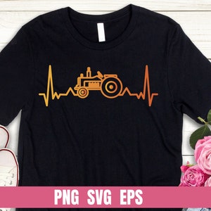 May include: Black t-shirt with an orange tractor silhouette inside a heart beat line. The text "PNG SVG EPS" is at the bottom of the shirt.