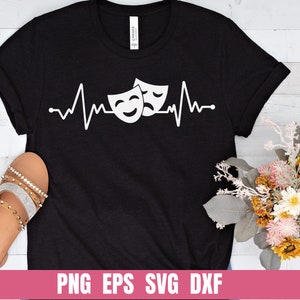 May include: Black t-shirt with a white design of two theater masks with a heartbeat line. The text "PNG EPS SVG DXF" is at the bottom of the image.