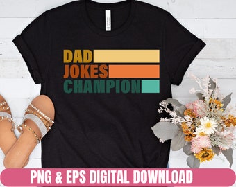 May include: Black t-shirt with a retro-style design that says "Dad Jokes Champion" in green, orange, and yellow stripes.