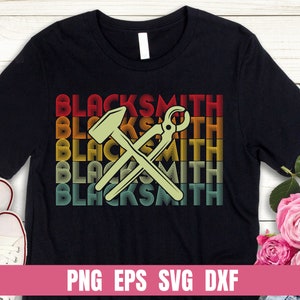 May include: Black t-shirt with a vintage-style graphic of a hammer and pliers crossed over each other. The text "Blacksmith" is repeated in a rainbow pattern.