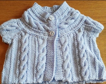 Handmade knitted child's cable cardigan