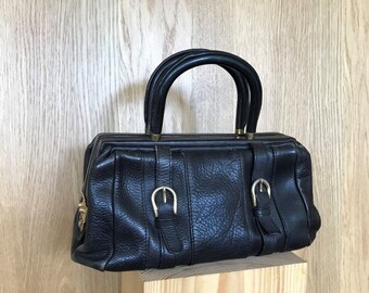 Tote bag small doctor's bag made of thick grained black leather from the 1950s